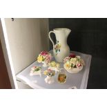 Radford floral jug and six Royal Doulton flower baskets