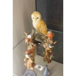 Five ceramic bird figures,