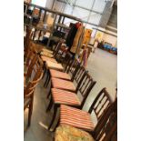 Six spindle back cushioned dining chairs