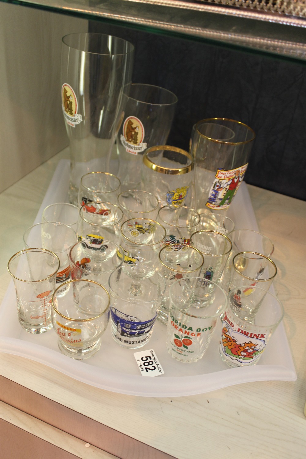 Tray of vintage glasses including graduated boot glasses