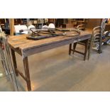 Folding plank topped table