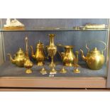 Shelf of mixed brass items