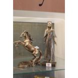 Cast resin Egyptian figure and a similar horse