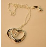 Stamped 925 silver ladies necklace with two stamped 925 linked heart shaped pendants