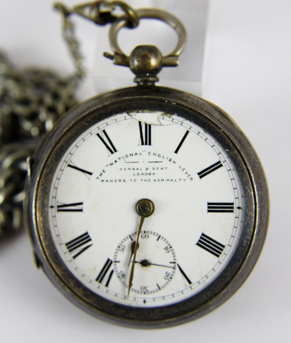 Hallmarked silver open faced key wind pocket watch lacking crystal with white metal Albert chain.