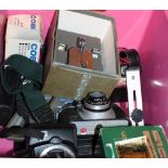 Box of vintage cameras and assosciated equipment