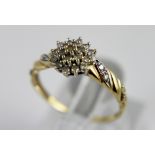 9 ct gold 0.25 ct diamond cluster ring.