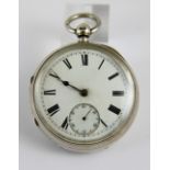 Hallmarked silver open face key wind pocket watch with roman numerals.