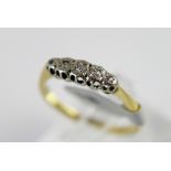 18 ct gold and platinum vintage five stone diamond ring. 2.5g.