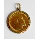 Half sovereign with 9 ct gold mount. Total 4.