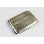 Silver matchbook holder.