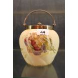 Antique cream biscuit barrel with plated handle and lid