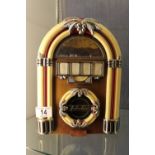 Radio in the form of a 1950's juke box.