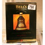 Boxed 1994 commemorative Bells whisky decanter sealed with contents