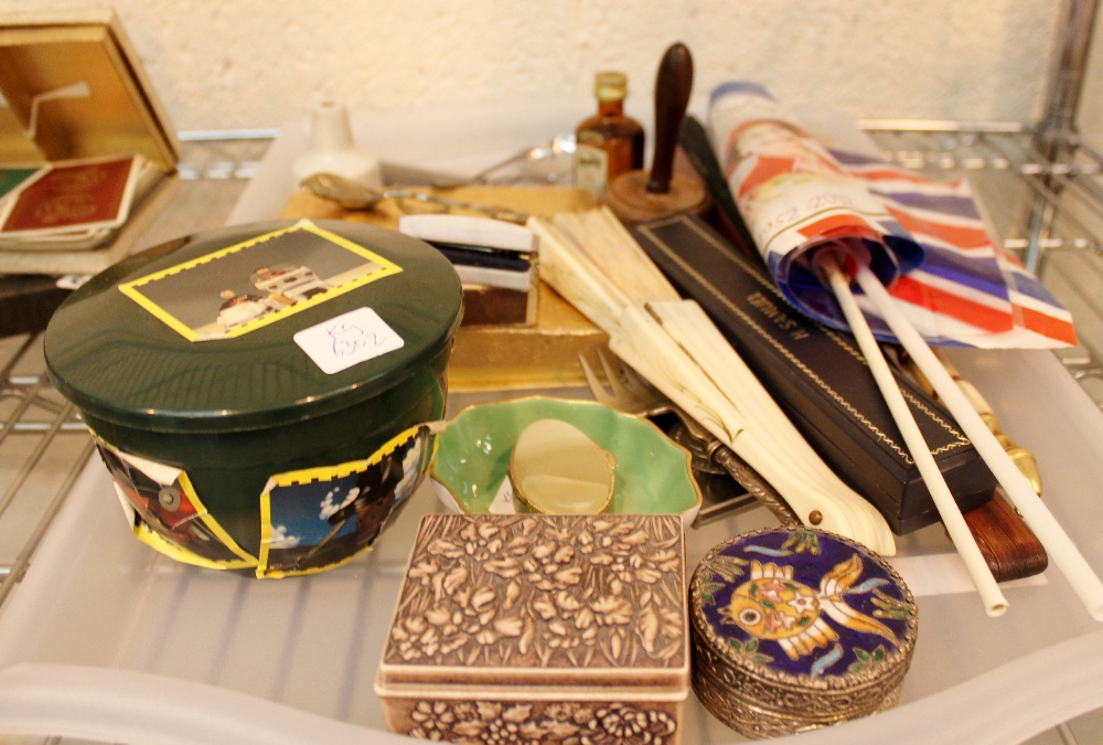 Tray of collectable items including fans and a magnifying glass