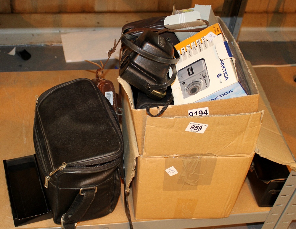 Box of cameras and mobile phones