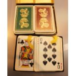 Two sets of vintage boxed playing cards