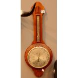 Shortland banjo aneroid barometer thermometer with carved wood frame.