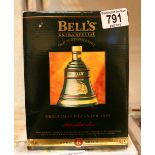 Boxed 1995 commemorative Bells whisky decanter sealed with contents