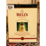 Boxed 1998 commemorative Bells whisky decanter sealed with contents