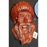 Antique carved head of eastern gentleman with ivory eyes and teeth