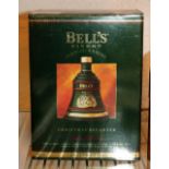 Boxed 1993 commemorative Bells whisky decanter sealed with contents