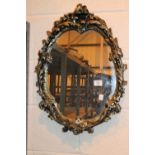 Ornate gold framed mirror