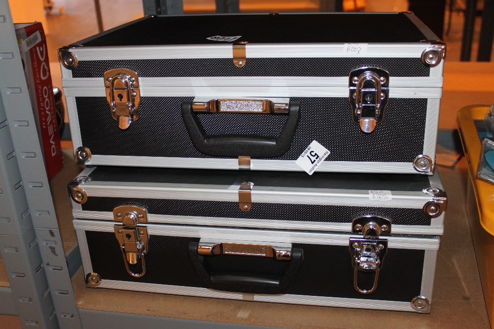 Two hard cased briefcase with a Multiswivel dry drill