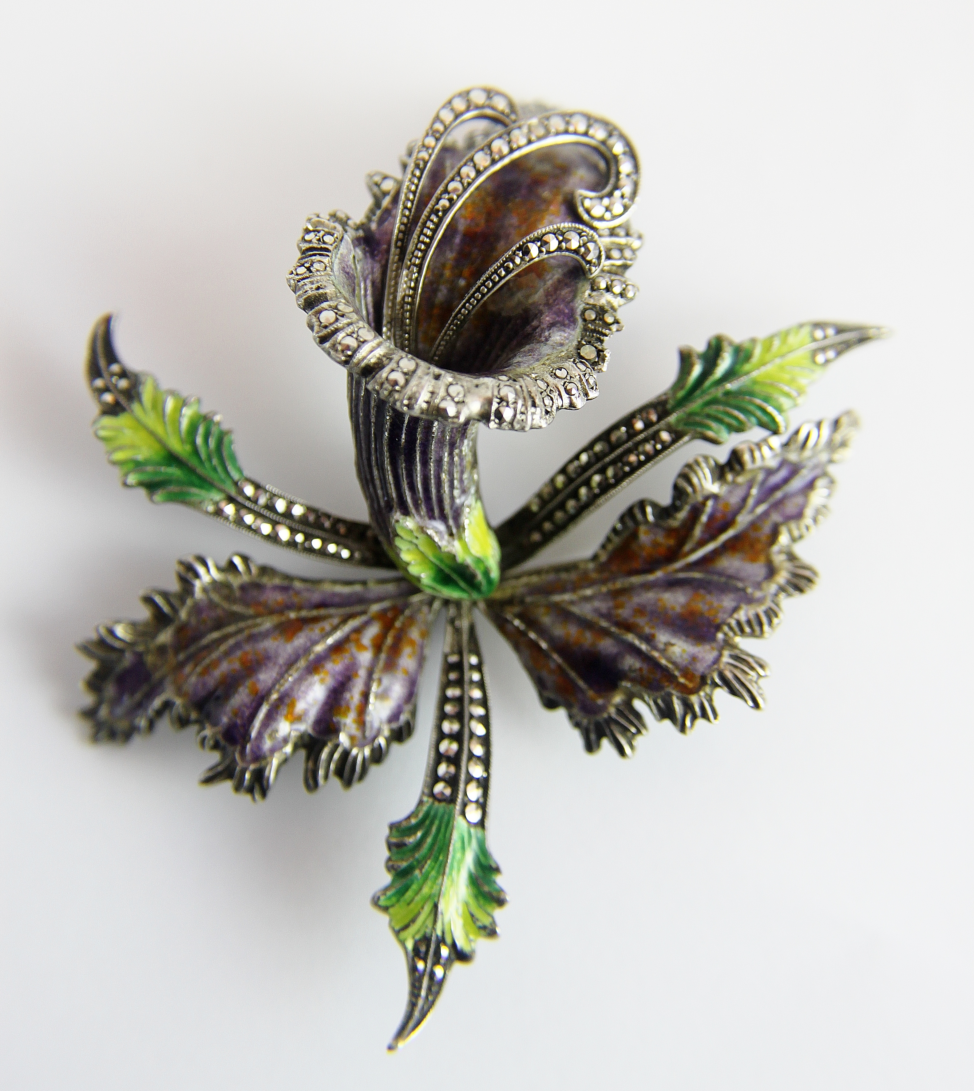 Presumed silver marcasite & enamel orchid brooch. H: 9.5 cm.