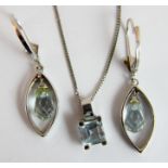 9 ct white gold blue topaz pendant and earring set