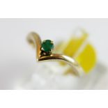 9 ct gold emerald set wishbone ring,