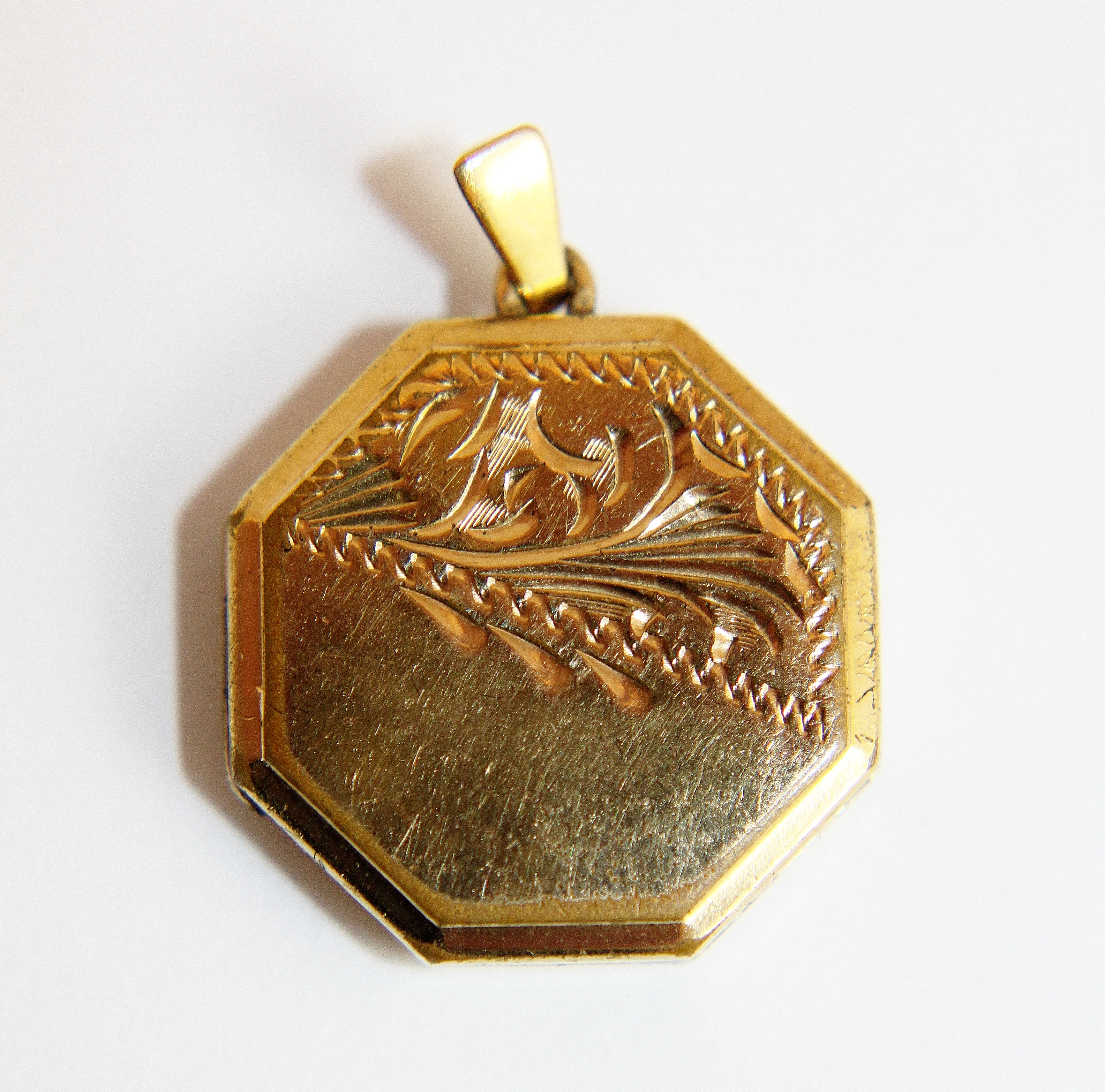 Rolled gold locket