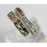 Two sterling silver dress rings,