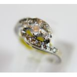 14 ct white gold three stone diamond ring with diamond set mount, approx 0.