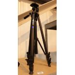Camera tripod marked HK-202 with leather case
