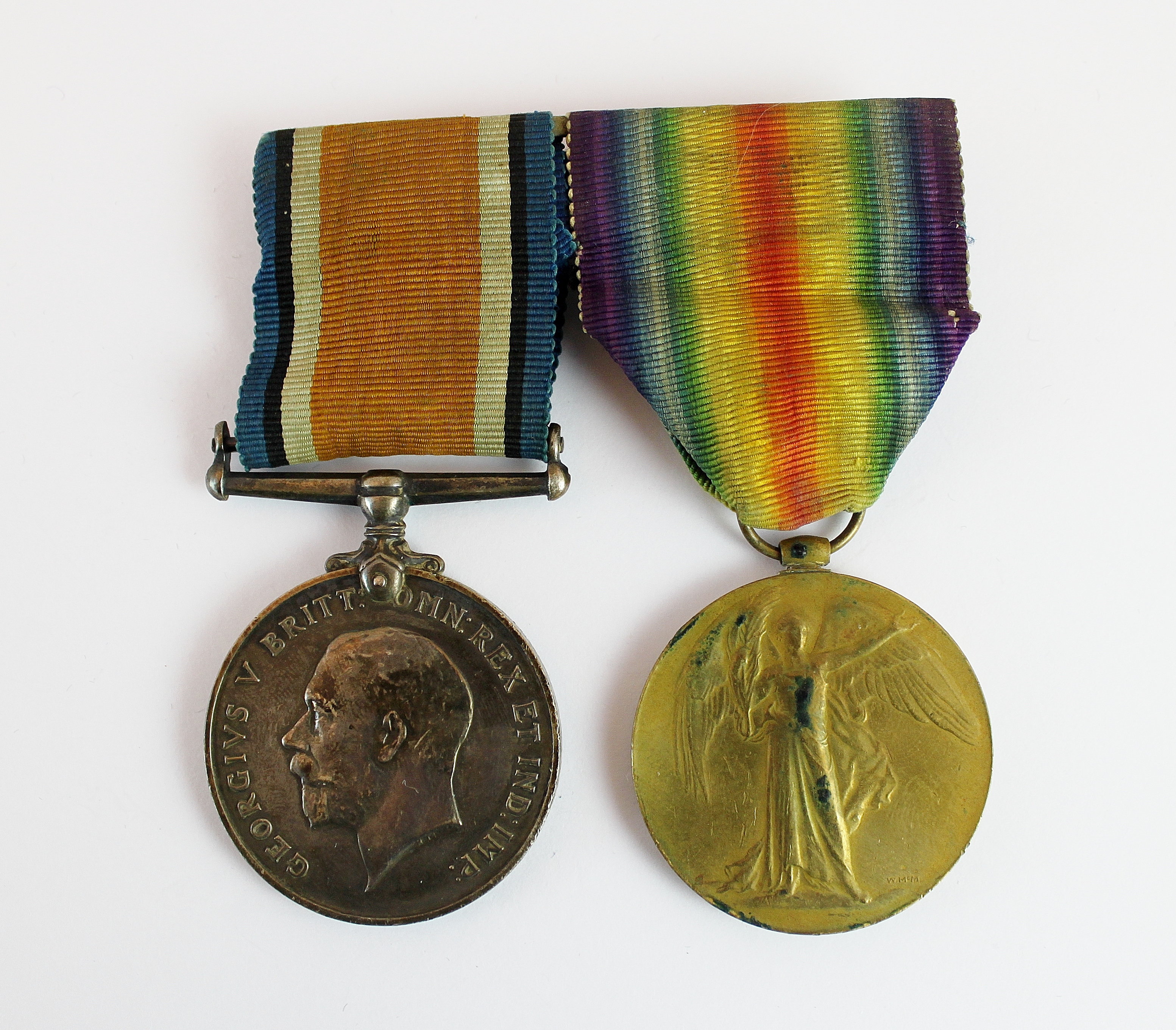 Two WWI medals with ribbons to C-3277 Cpl. C.