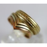 Two 9 ct gold rings, one a three colour wishbone. Size N.