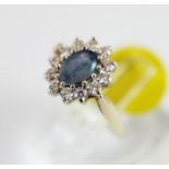 9 ct gold opal and CZ ring,