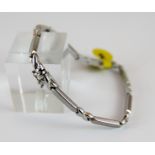 9 ct white gold stone set satin finish bracelet,