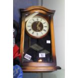 Wood cased Seiko quartz wall clock