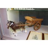 Ceramic cart horse and a wooden cart