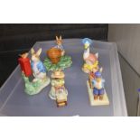 Four rabbit figurines and one duck including Royal Doulton,