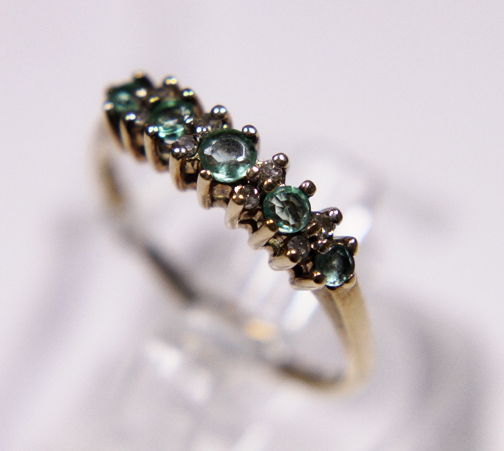 9 ct gold aquamarine and diamond ring,