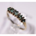 9 ct gold aquamarine and diamond ring,