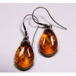 Pair of silver and amber earrings