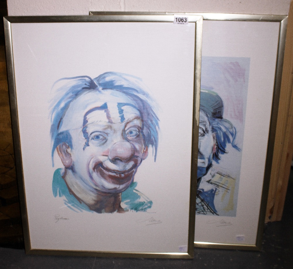 Two framed clown prints signed M Bulli.