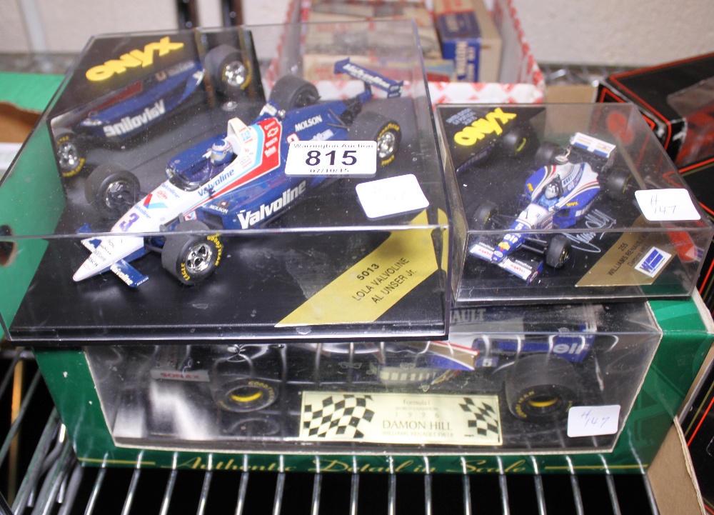 Two Renault Formula 1 cars Damon Hill and one Alunser American cart car