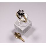 Gold 21 key pendant and a 9 ct gold sapphire dress ring