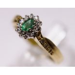 18 ct yellow gold emerald and diamond ring,