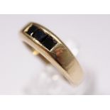 14 ct gold gents ring with three inset black diamonds. 6.